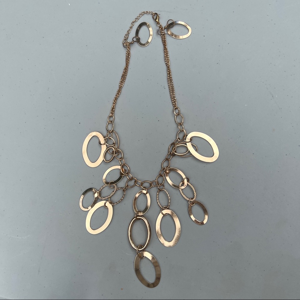 Gold colored necklace and earring set